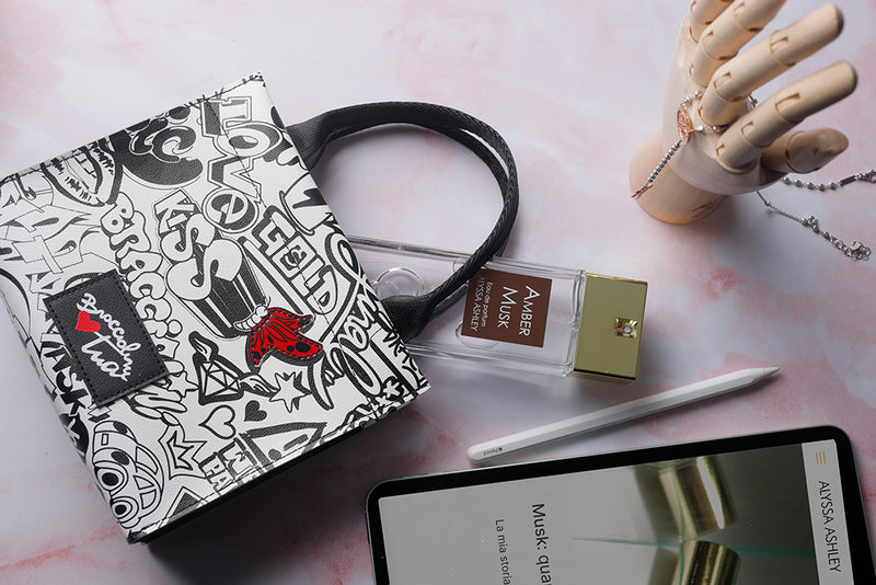 Amber Musk + Braccialini bag set